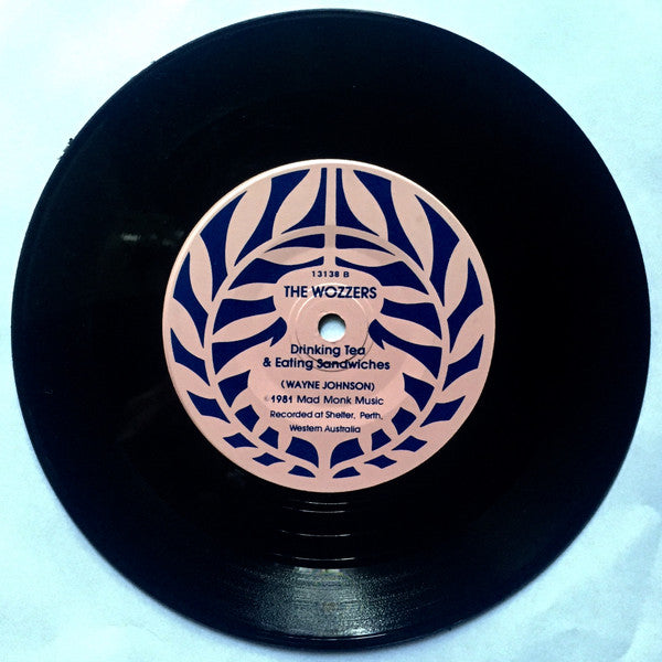 The Wozzers : Eating Pies & Drinking Tinnies (7", Single)