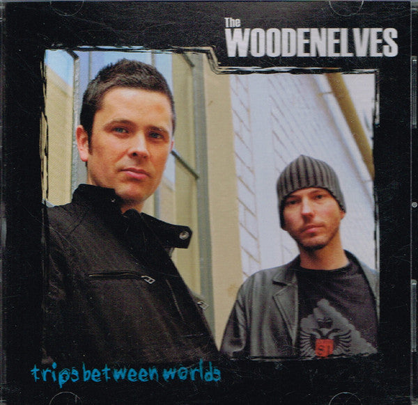The Woodenelves : Trips Between Worlds (CD, Album)