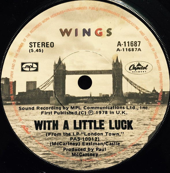 Wings (2) : With A Little Luck (7", Single, Lab)