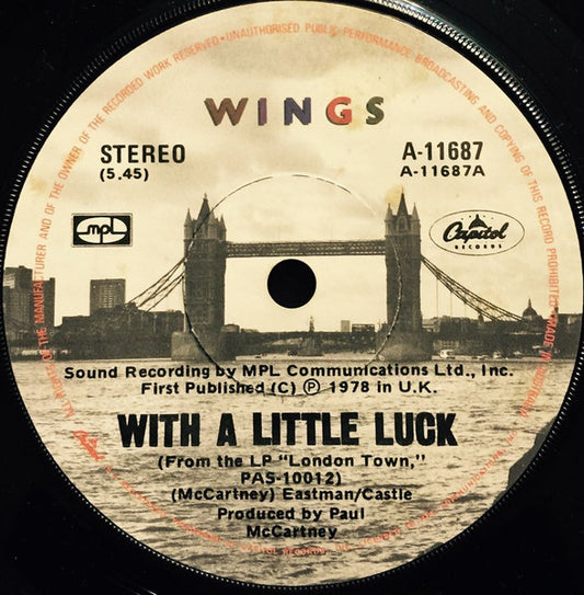 Wings (2) : With A Little Luck (7", Single, Lab)