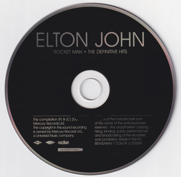Elton John : Rocket Man • The Definitive Hits (CD, Comp + DVD-V, Comp, Reg)