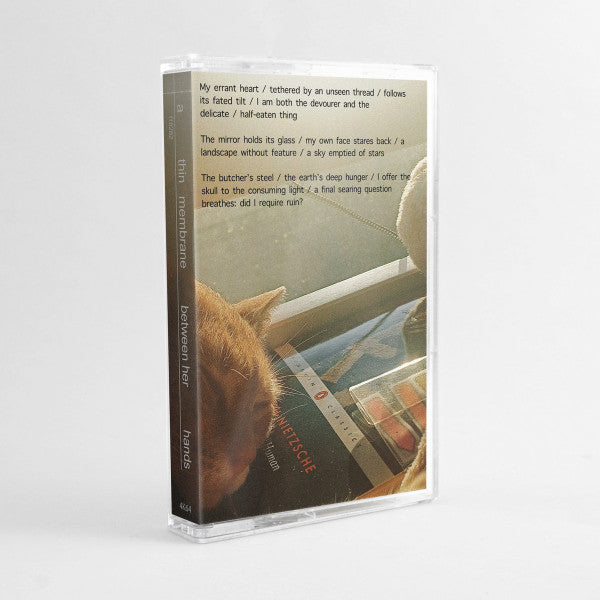 ff8282 : a thin membrane between her hands (Cass, Album)