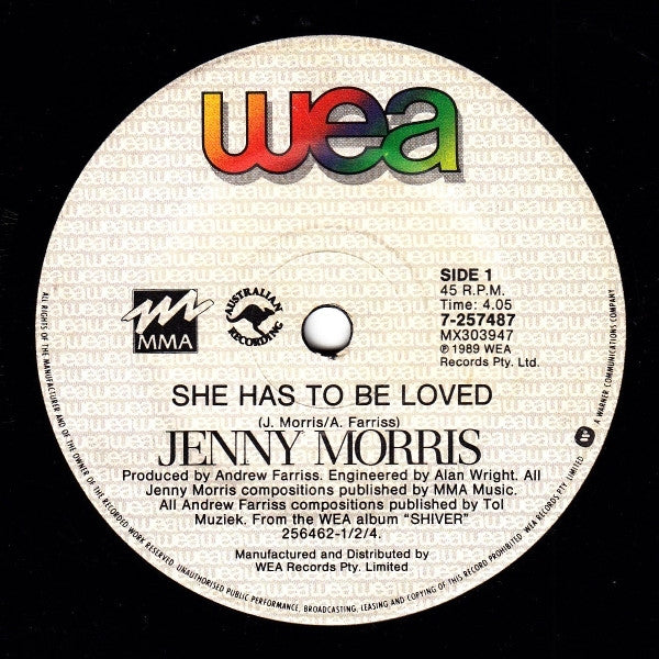 Jenny Morris : She Has To Be Loved (7", Single)