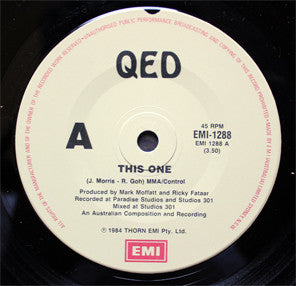 QED* : This One (7", Single)