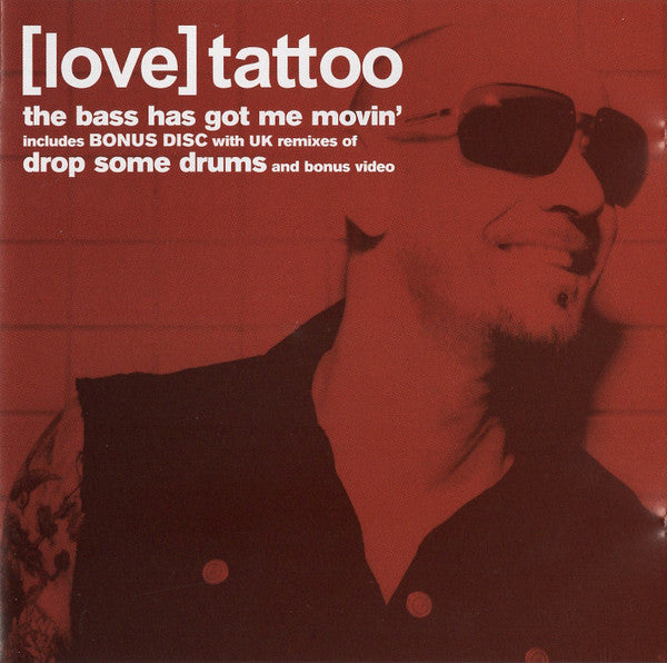 [Love] Tattoo : The Bass Has Got Me Movin' (CD, Single + CD, Single, Enh)