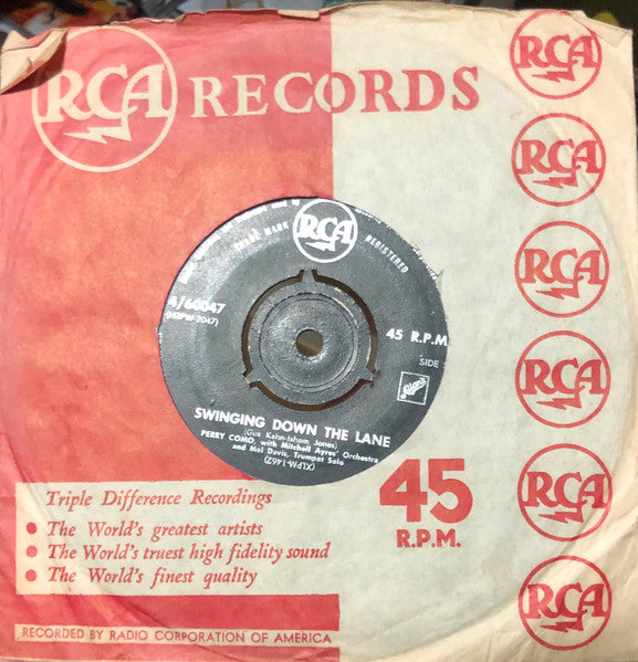 Perry Como : Kewpie Doll (7", Single)