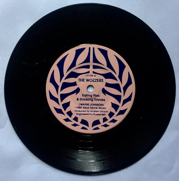The Wozzers : Eating Pies & Drinking Tinnies (7", Single)