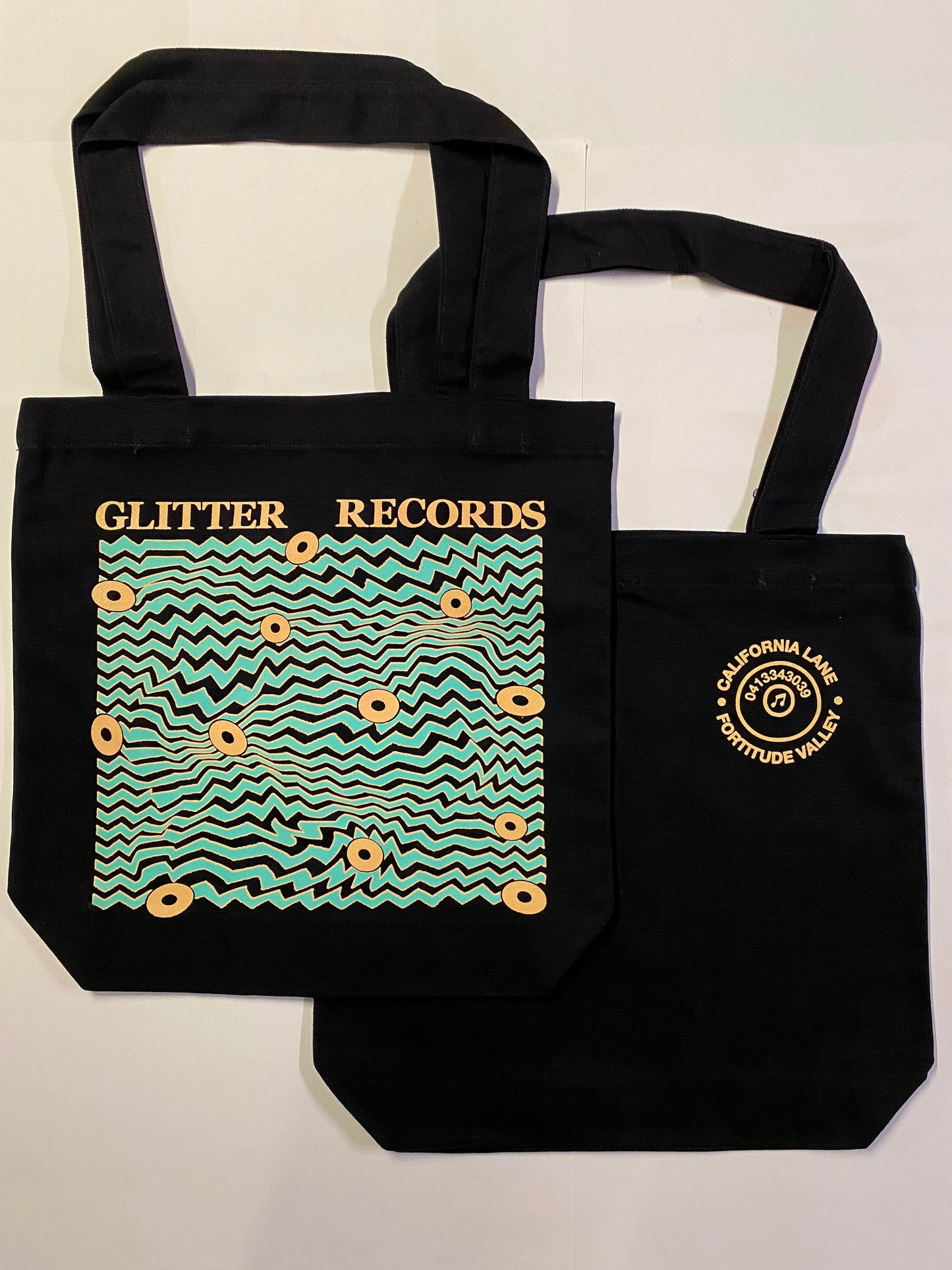 “Electric Teal Glitter Records × No.7 Print House 2026 tote bag, hand‑printed in Brisbane on heavy‑grade cotton with minimal design.”